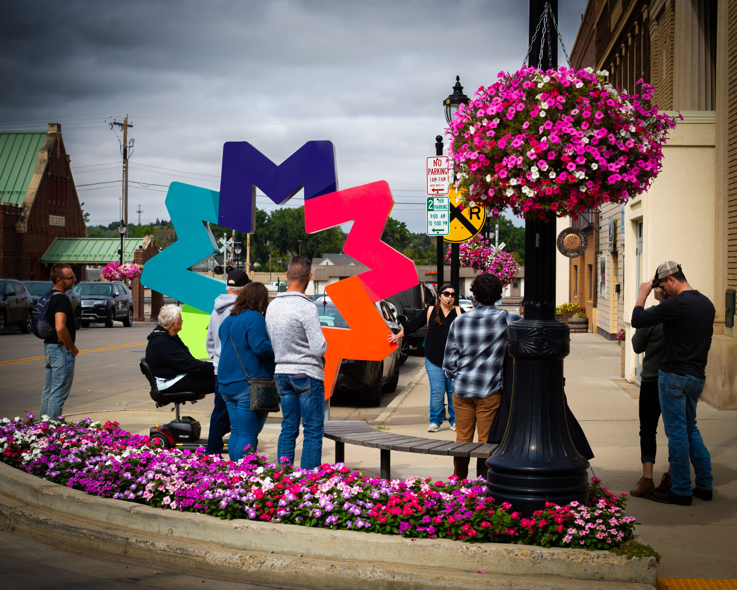 Downtown Minot One Brand Symbol - History of The Taube Museum of Art